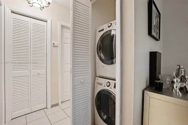 a view of a hallway with washer and dryer