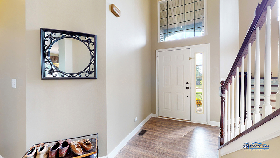 788 North Overlook Trail Round Lake, IL 60073 - Photo 18 of 45 a view of a hallway with wooden floor and door