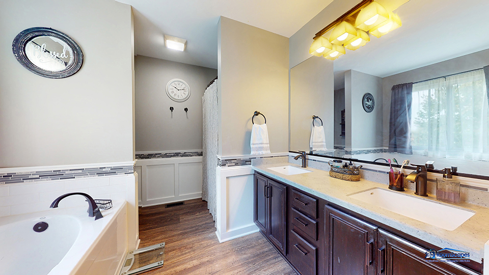 788 North Overlook Trail Round Lake, IL 60073 - Photo 24 of 45 a bathroom with a double vanity sink and a mirror