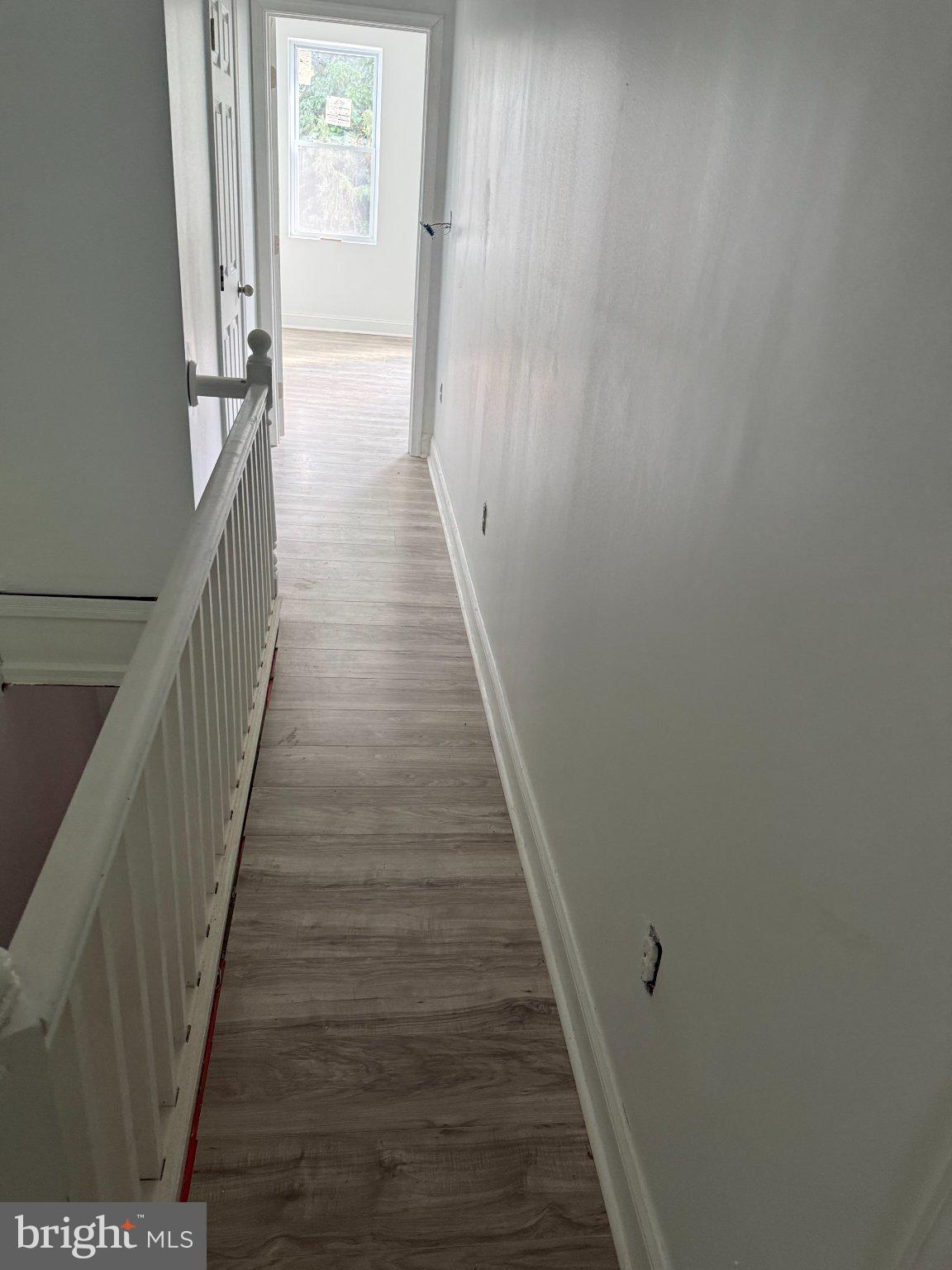 1770 Homestead Street Baltimore, MD 21218 - Photo 2 of 6 Bright and inviting hallway awaits.