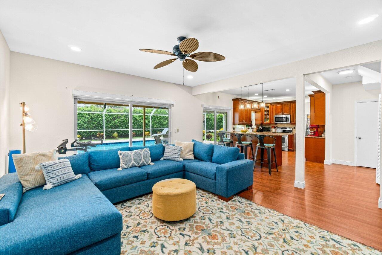 22145 Appleton Drive Boca Raton, FL 33428 - Photo 14 of 31 a living room with furniture and a large window