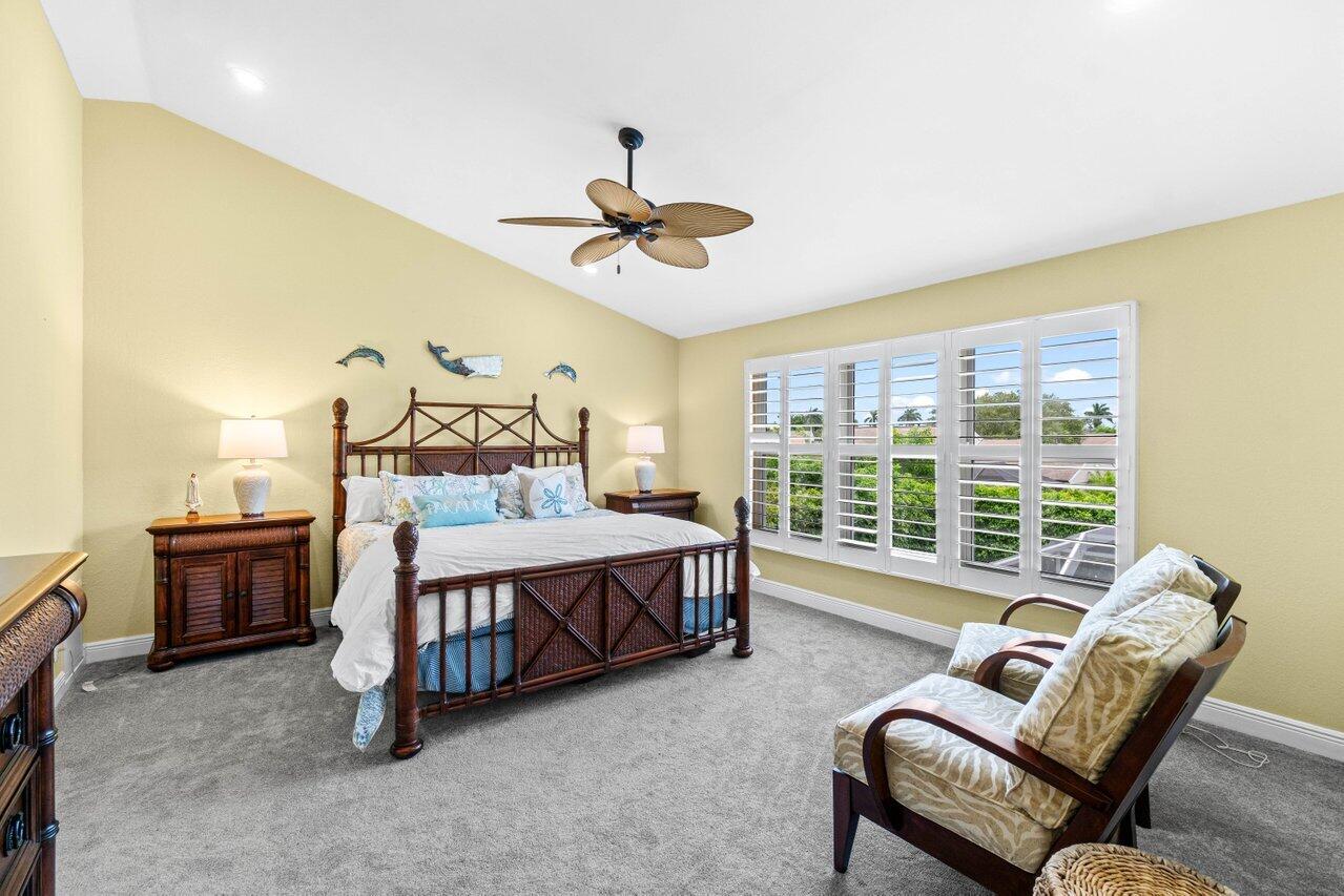 22145 Appleton Drive Boca Raton, FL 33428 - Photo 16 of 31 a bed room with a bed and a couch