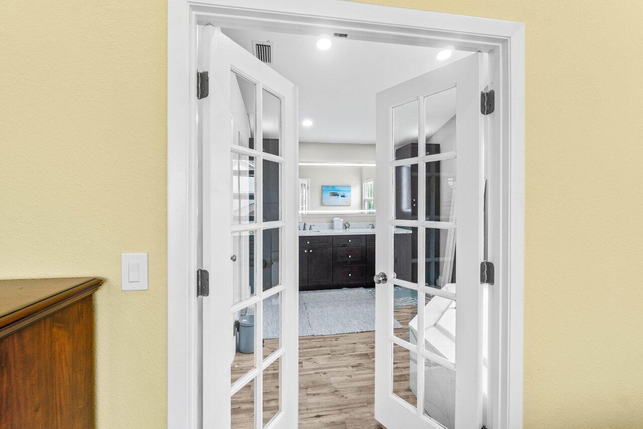 22145 Appleton Drive Boca Raton, FL 33428 - Photo 17 of 31 a kitchen with stainless steel appliances a refrigerator and cabinets