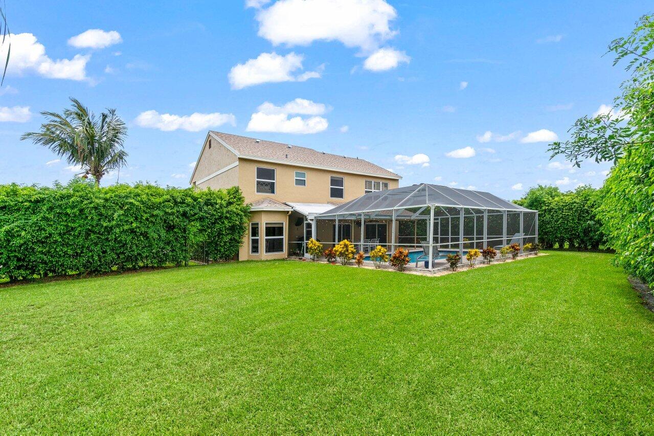 22145 Appleton Drive Boca Raton, FL 33428 - Photo 29 of 31 a view of a house with a big yard plants and large trees