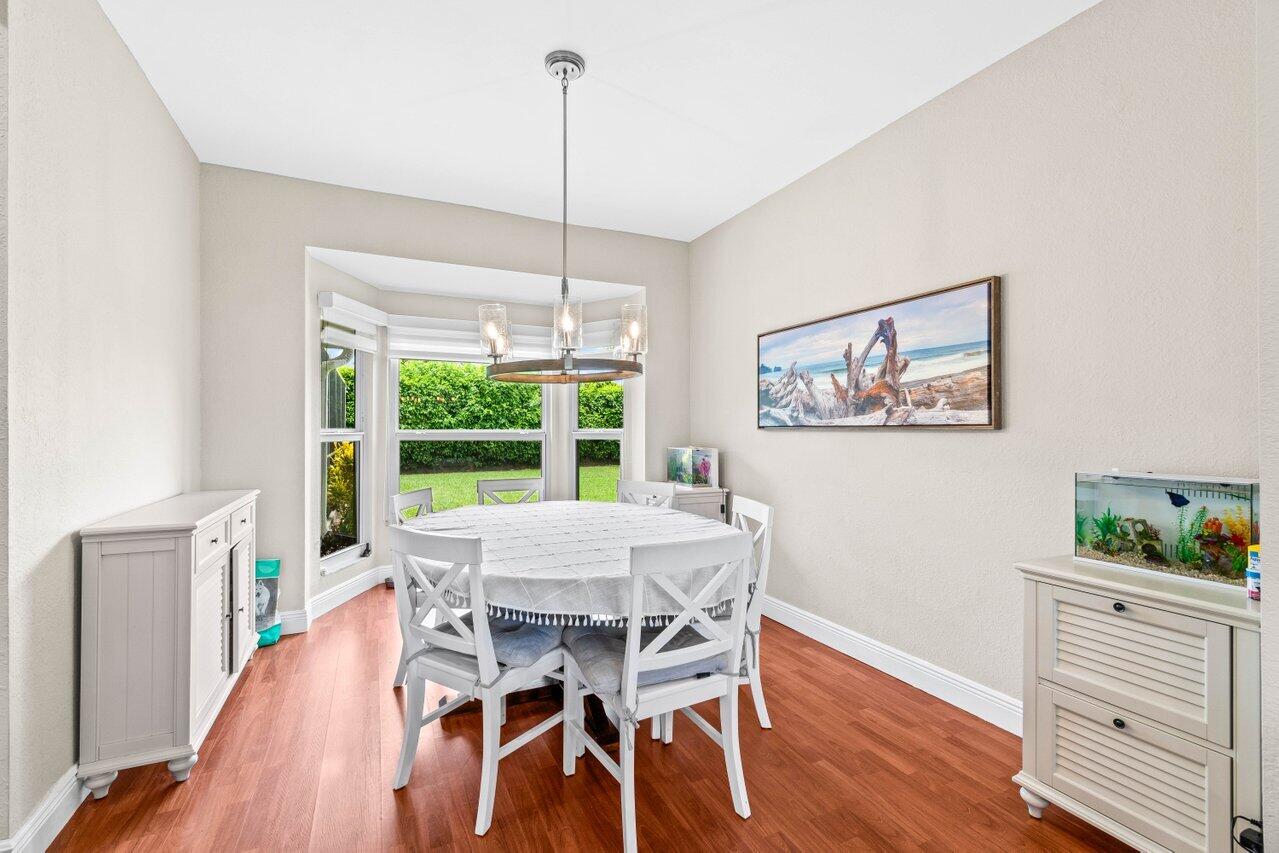 22145 Appleton Drive Boca Raton, FL 33428 - Photo 6 of 31 a view of a dining room with furniture window and wooden floor