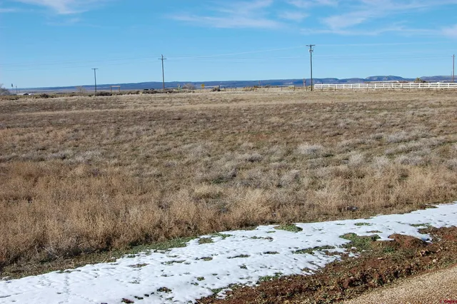 a view of a road with an empty space