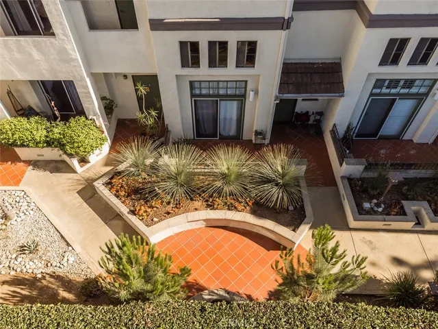 a view of living room with furniture and a fireplace