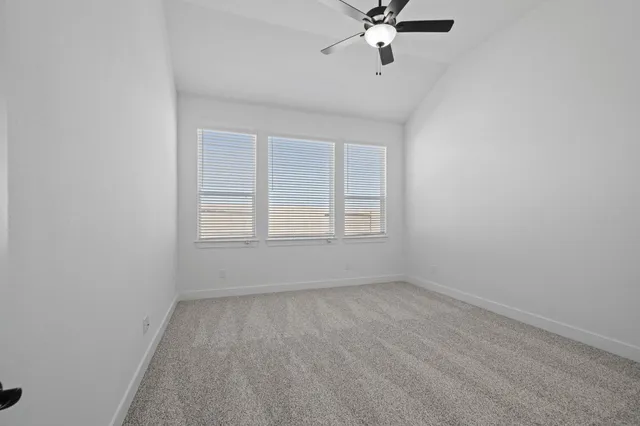 a bathroom with a double vanity sink mirror and shower