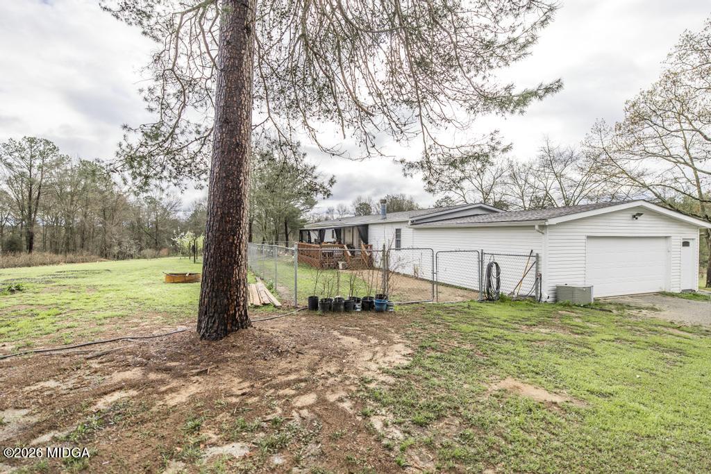 319 Pope Road Roberta, GA 31078 - Photo 30 of 42 a backyard of a house with lots of green space