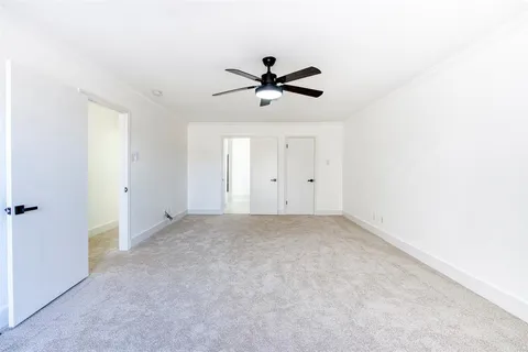 a view of a ceiling fan in a room