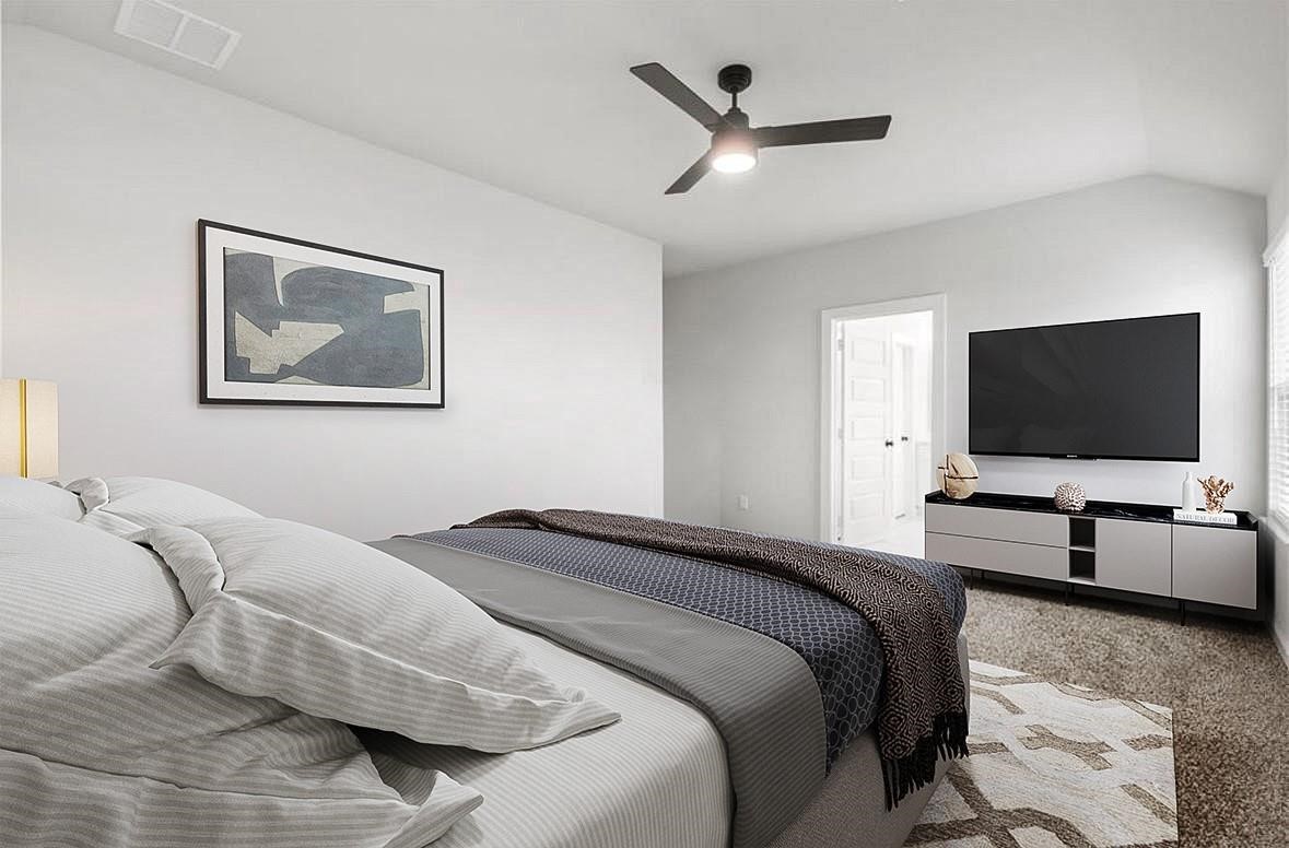 6427 Bolinas Court Rosharon, TX 77583 - Photo 10 of 23 a bedroom with a bed and a flat screen tv