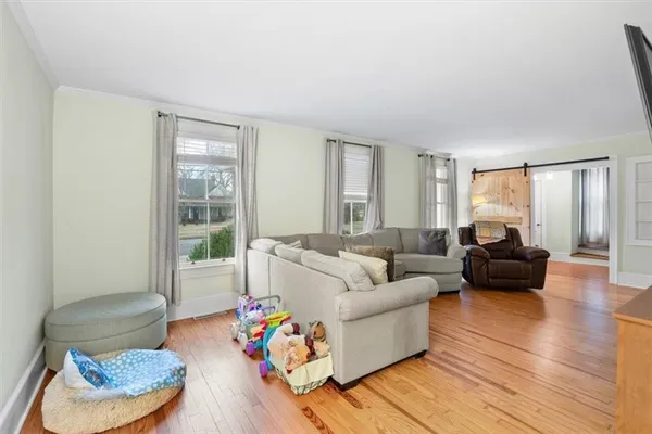 a living room with furniture and a couch