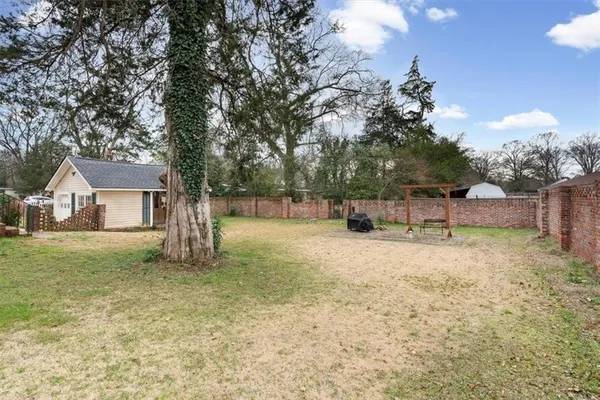 a house view with a garden space