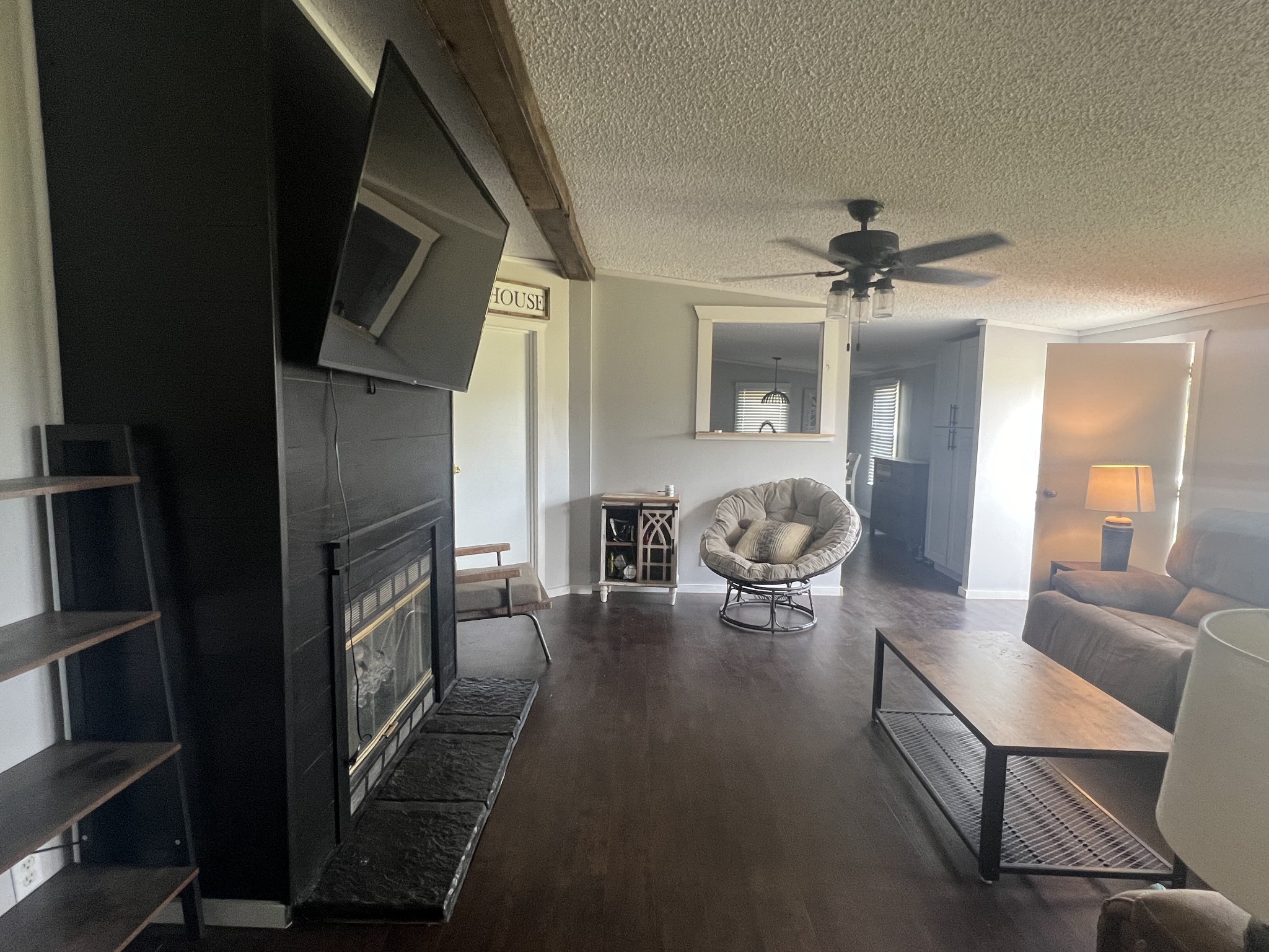 4439 Woodrow Wilson Road Springfield, TN 37172 - Photo 13 of 27 a living room with furniture and a flat screen tv