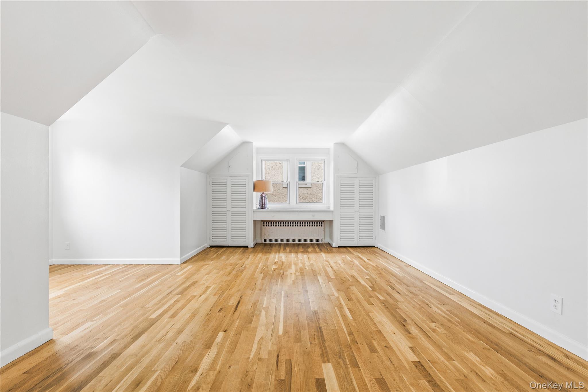 46 Mathews Street Harrison, NY 10528 - Photo 16 of 30 a view of wooden floor in an empty room