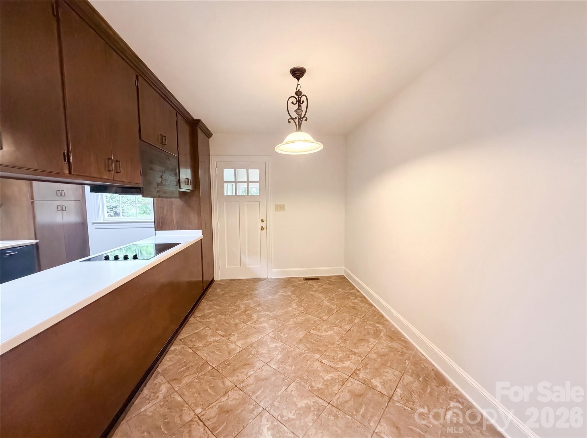 318 Valley Stream Road Statesville, NC 28677 - Photo 6 of 21 a kitchen with sink a stove and cabinets