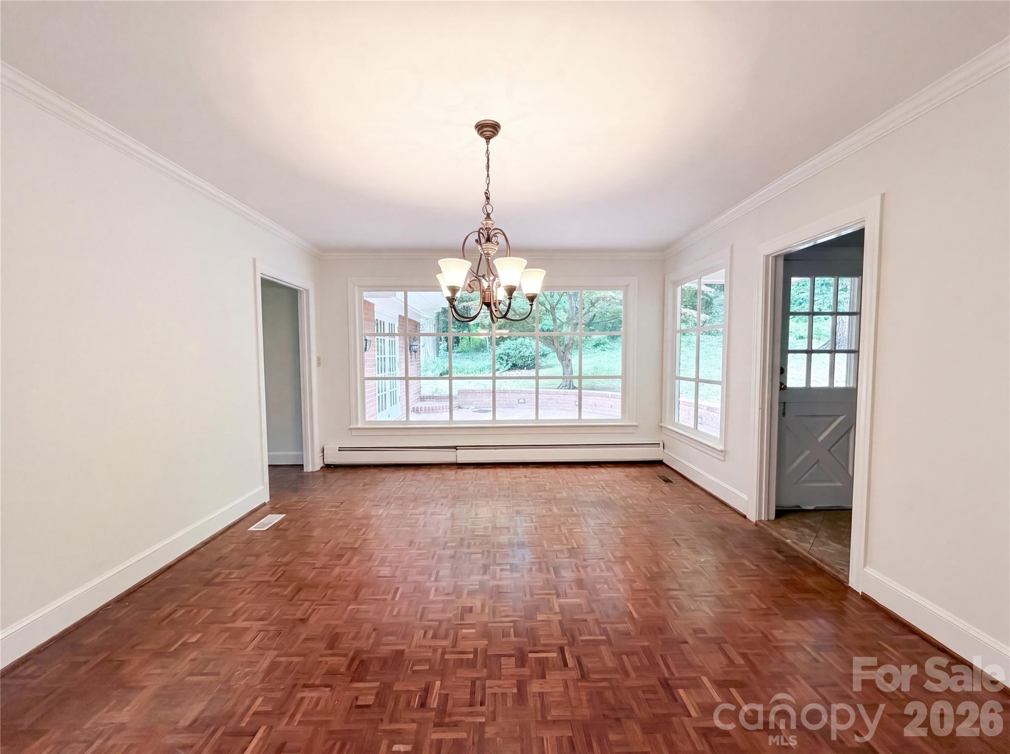 318 Valley Stream Road Statesville, NC 28677 - Photo 7 of 21 a view of an empty room with a window