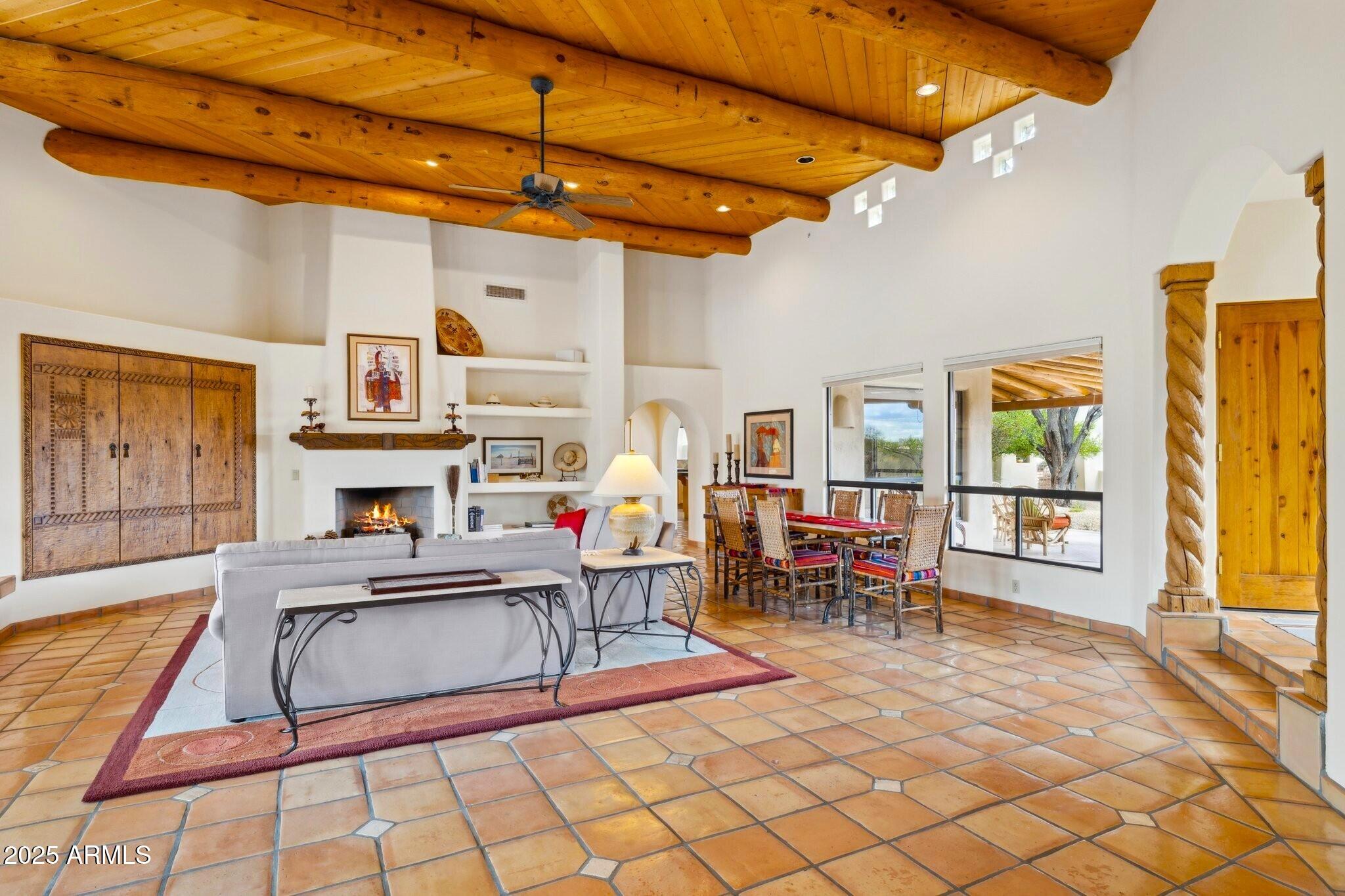 30600 North Pima Road, Unit 38 Scottsdale, AZ 85266 - Photo 10 of 49 a living room with fireplace furniture and a window