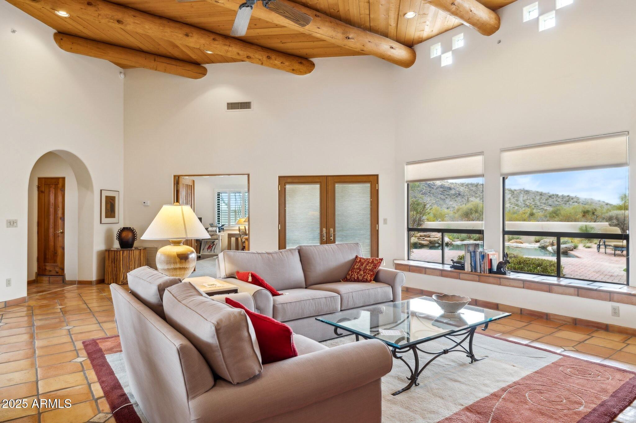 30600 North Pima Road, Unit 38 Scottsdale, AZ 85266 - Photo 13 of 49 a living room with furniture and a large window