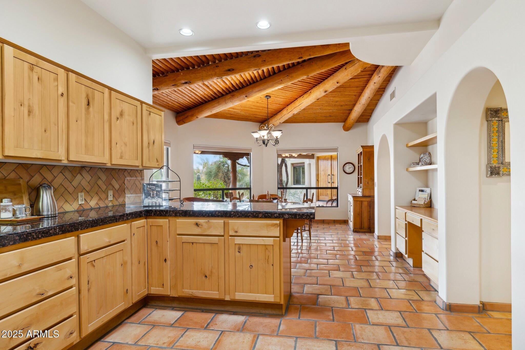 30600 North Pima Road, Unit 38 Scottsdale, AZ 85266 - Photo 16 of 49 a kitchen with a sink and cabinets