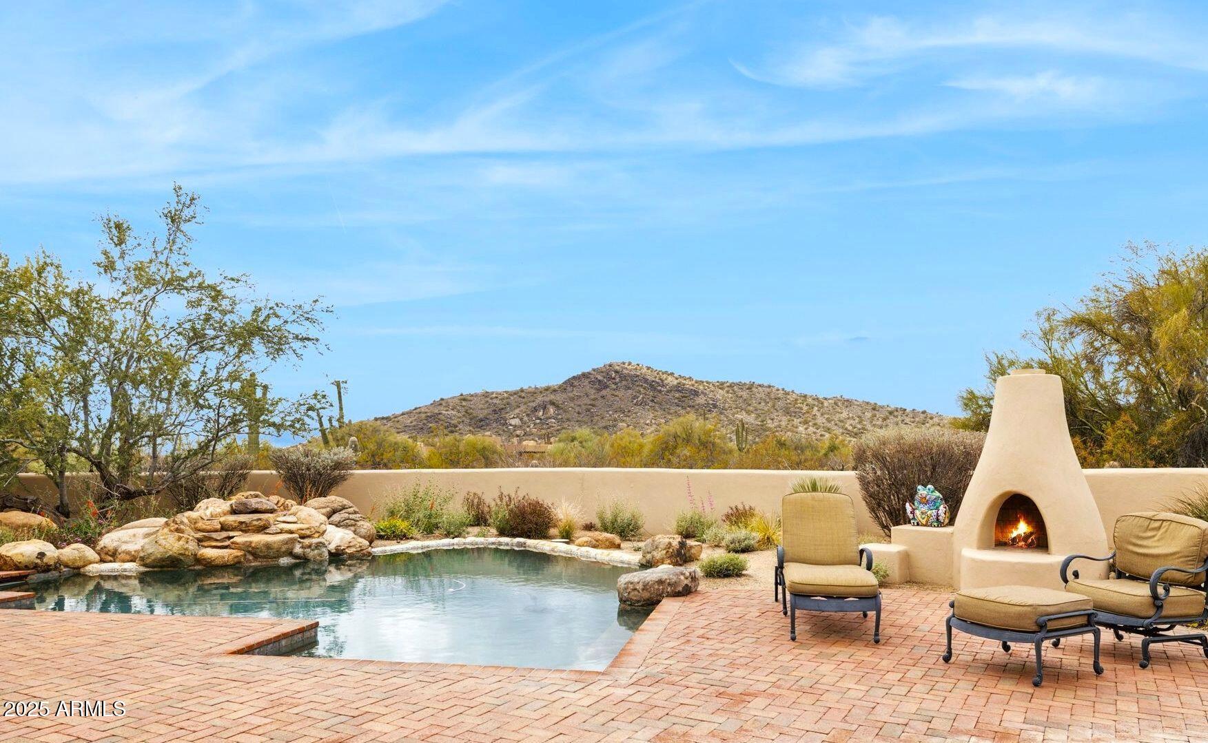 30600 North Pima Road, Unit 38 Scottsdale, AZ 85266 - Photo 2 of 49 a view of a lake with couches and city view