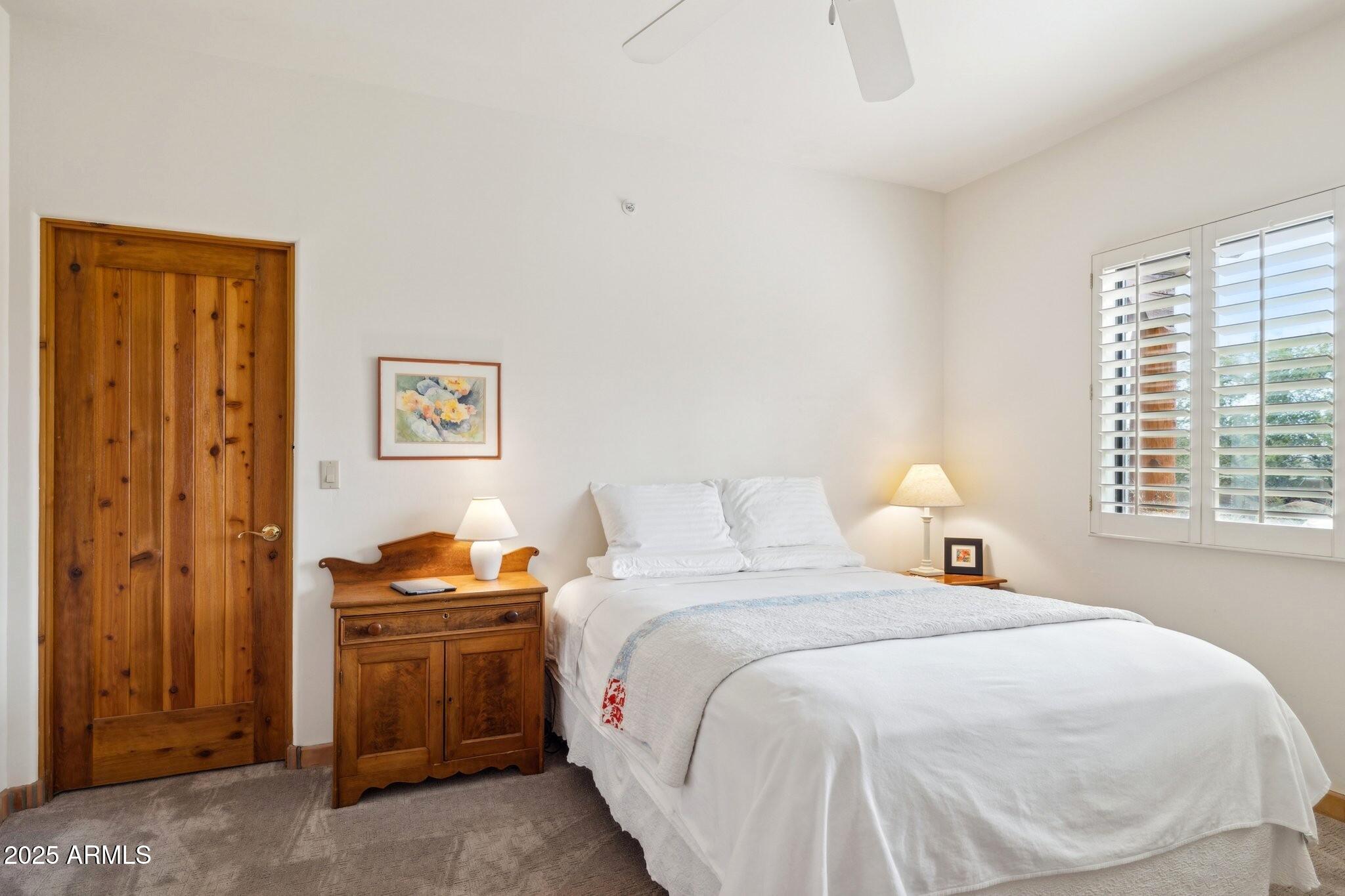 30600 North Pima Road, Unit 38 Scottsdale, AZ 85266 - Photo 34 of 49 a bedroom with bed and a window