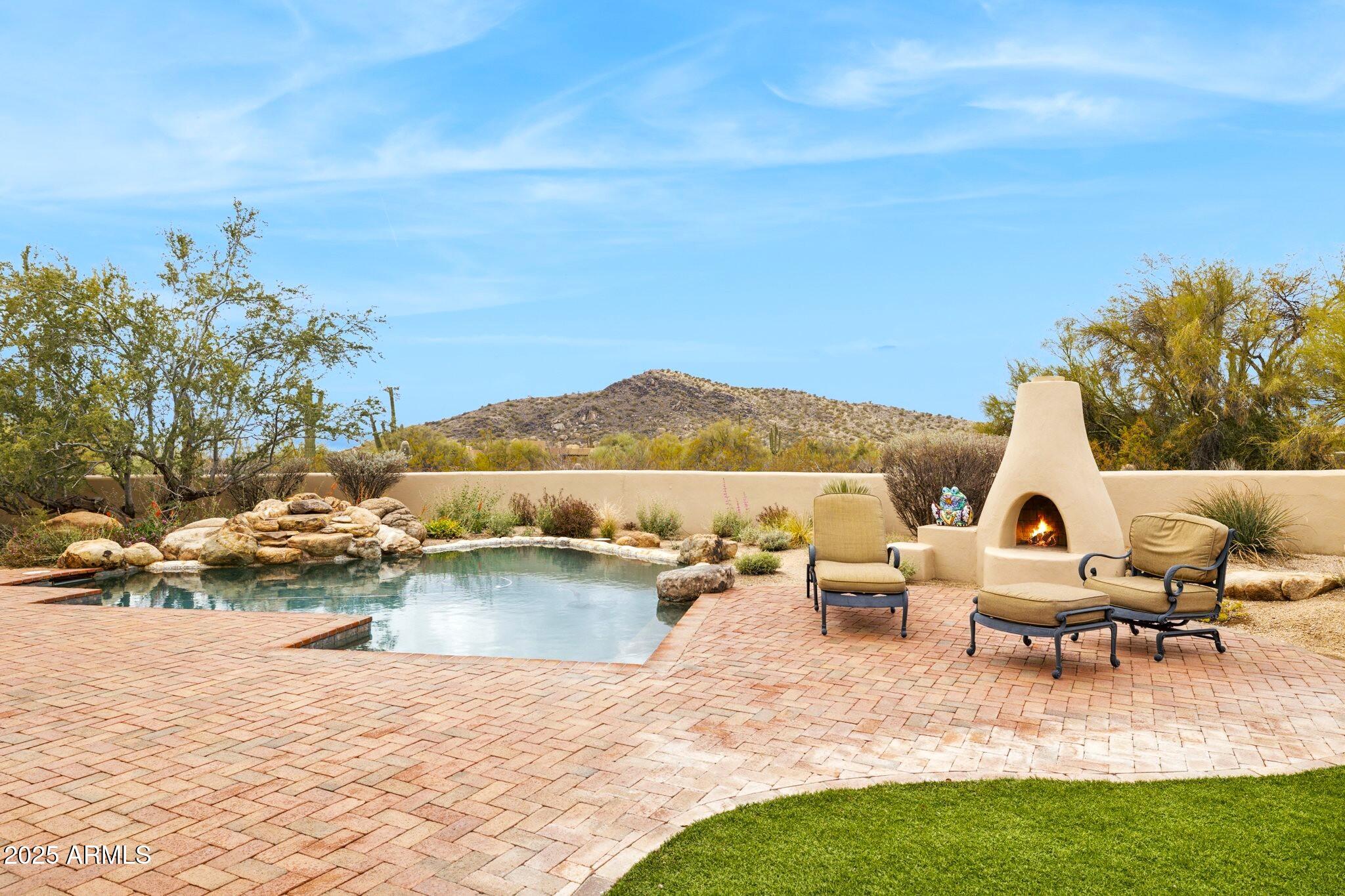 30600 North Pima Road, Unit 38 Scottsdale, AZ 85266 - Photo 44 of 49 a view of a lake with outdoor seating