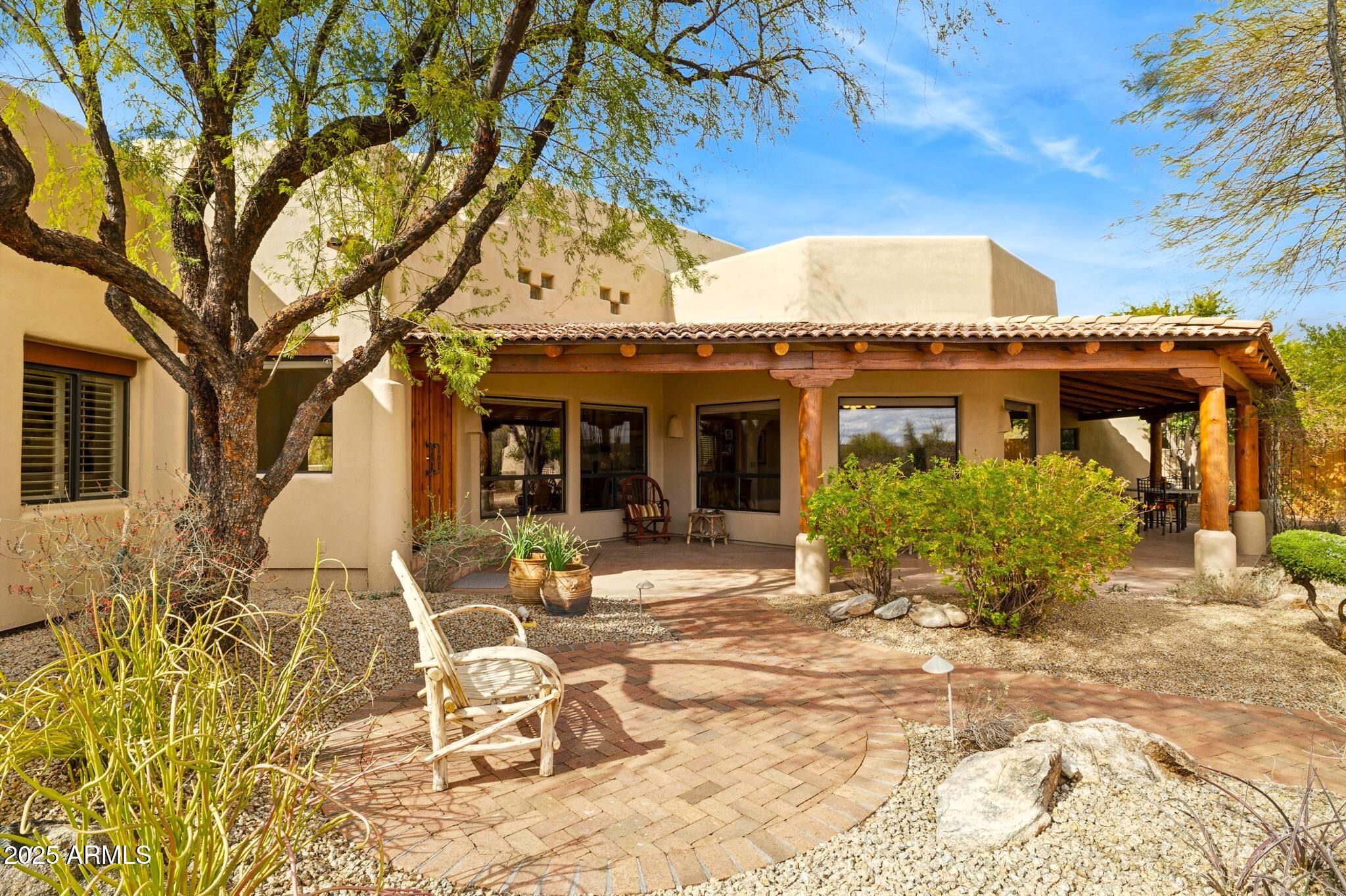 30600 North Pima Road, Unit 38 Scottsdale, AZ 85266 - Photo 5 of 49 a view of a house with backyard porch and sitting area