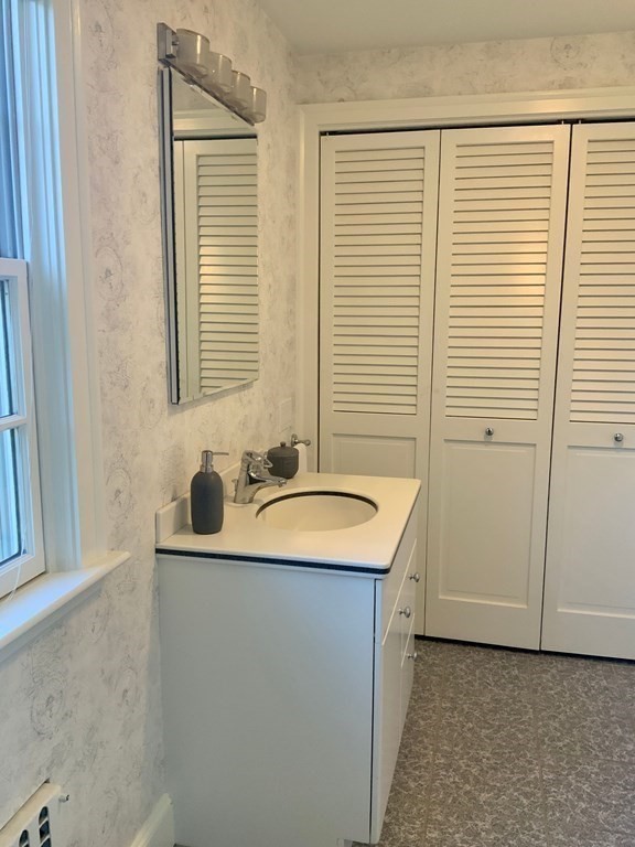 31 Grandview Road Arlington, MA 02476 - Photo 11 of 22 a bathroom with a sink and a shower