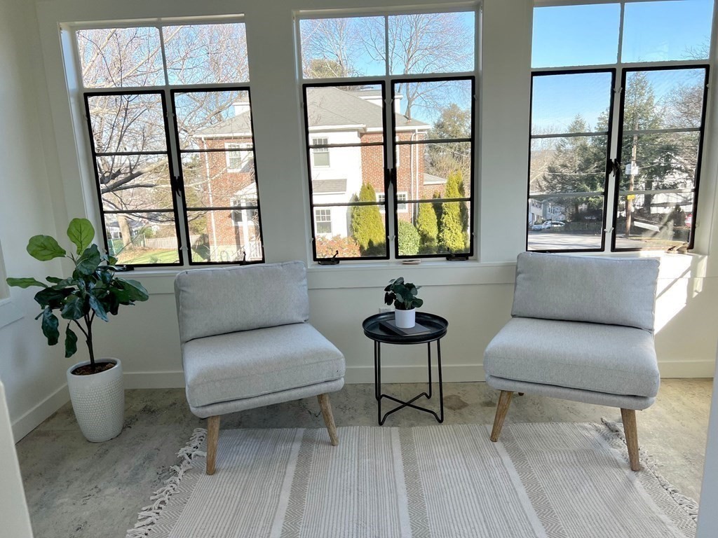 31 Grandview Road Arlington, MA 02476 - Photo 18 of 22 a living room with furniture and a potted plant