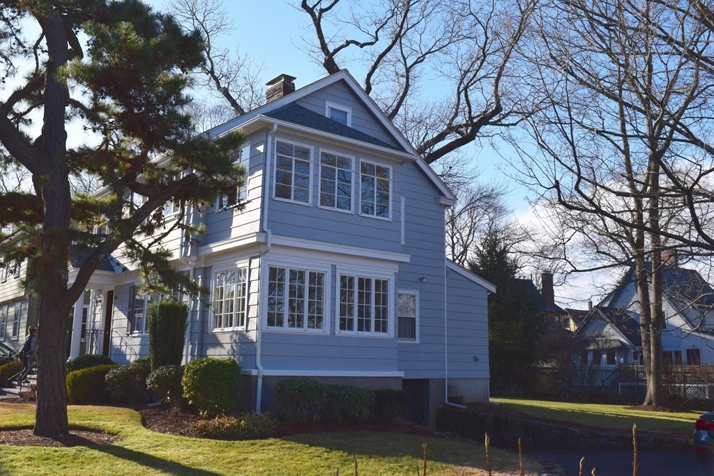 31 Grandview Road Arlington, MA 02476 - Photo 2 of 22 a front view of a house with garden