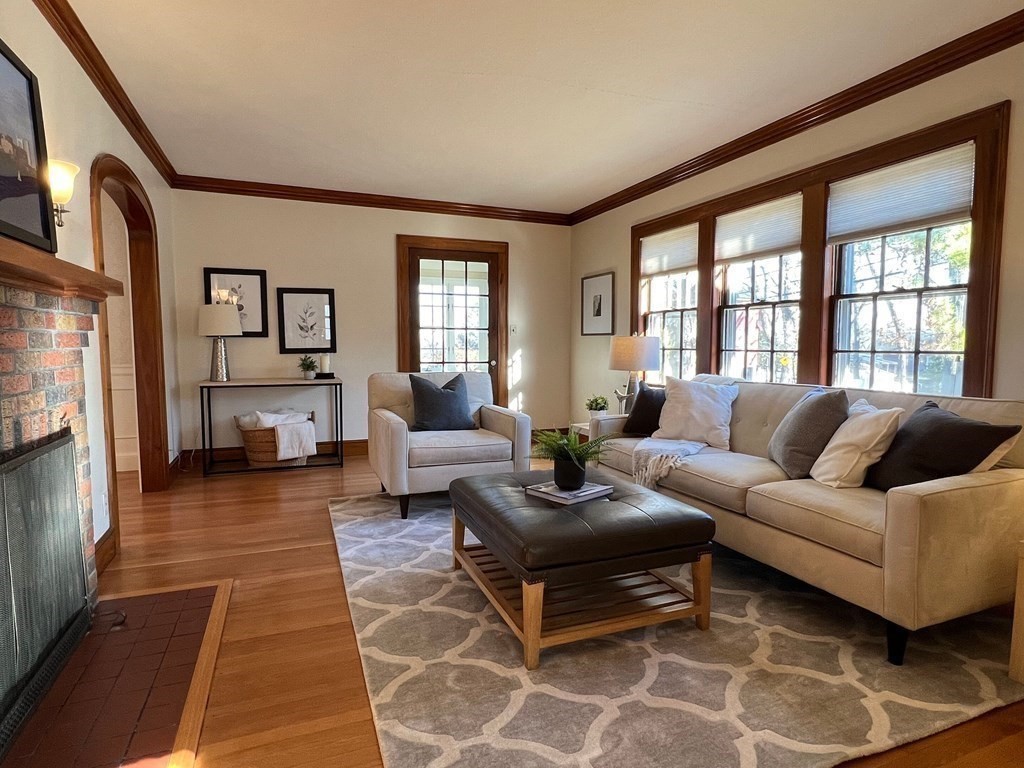 31 Grandview Road Arlington, MA 02476 - Photo 5 of 22 a living room with furniture and a fireplace