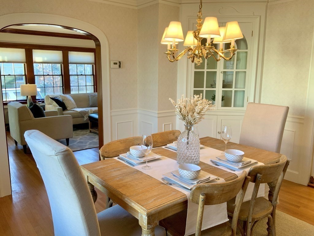 31 Grandview Road Arlington, MA 02476 - Photo 8 of 22 a view of a dining room with furniture and chandelier