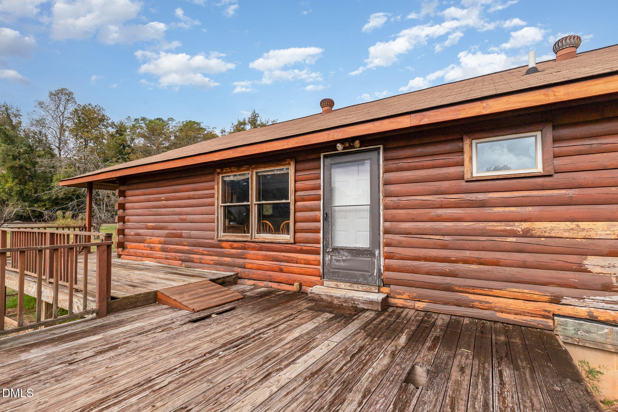 3018 University Station Road Durham, NC 27705 - Photo 25 of 32 a view of a house with a roof deck