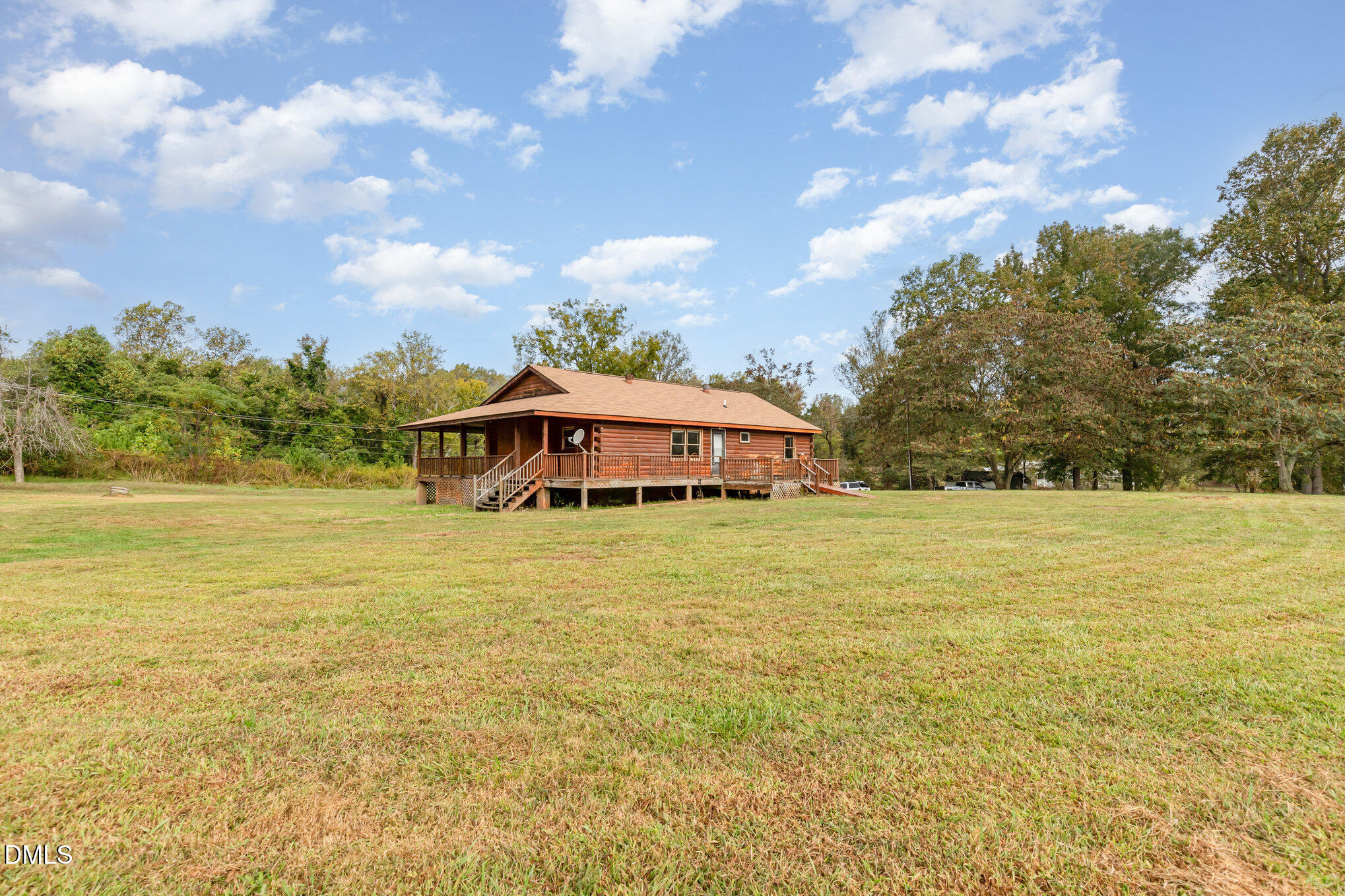 3018 University Station Road Durham, NC 27705 - Photo 28 of 32 a view of a lake with a big yard