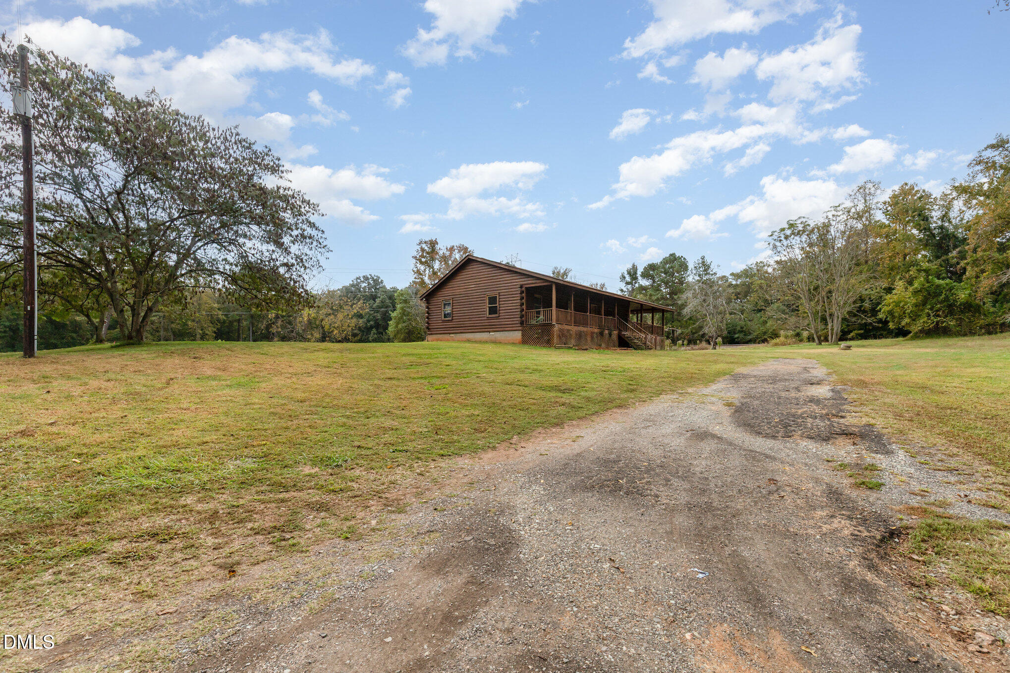 3018 University Station Road Durham, NC 27705 - Photo 3 of 32 a view of a lake with a big yard