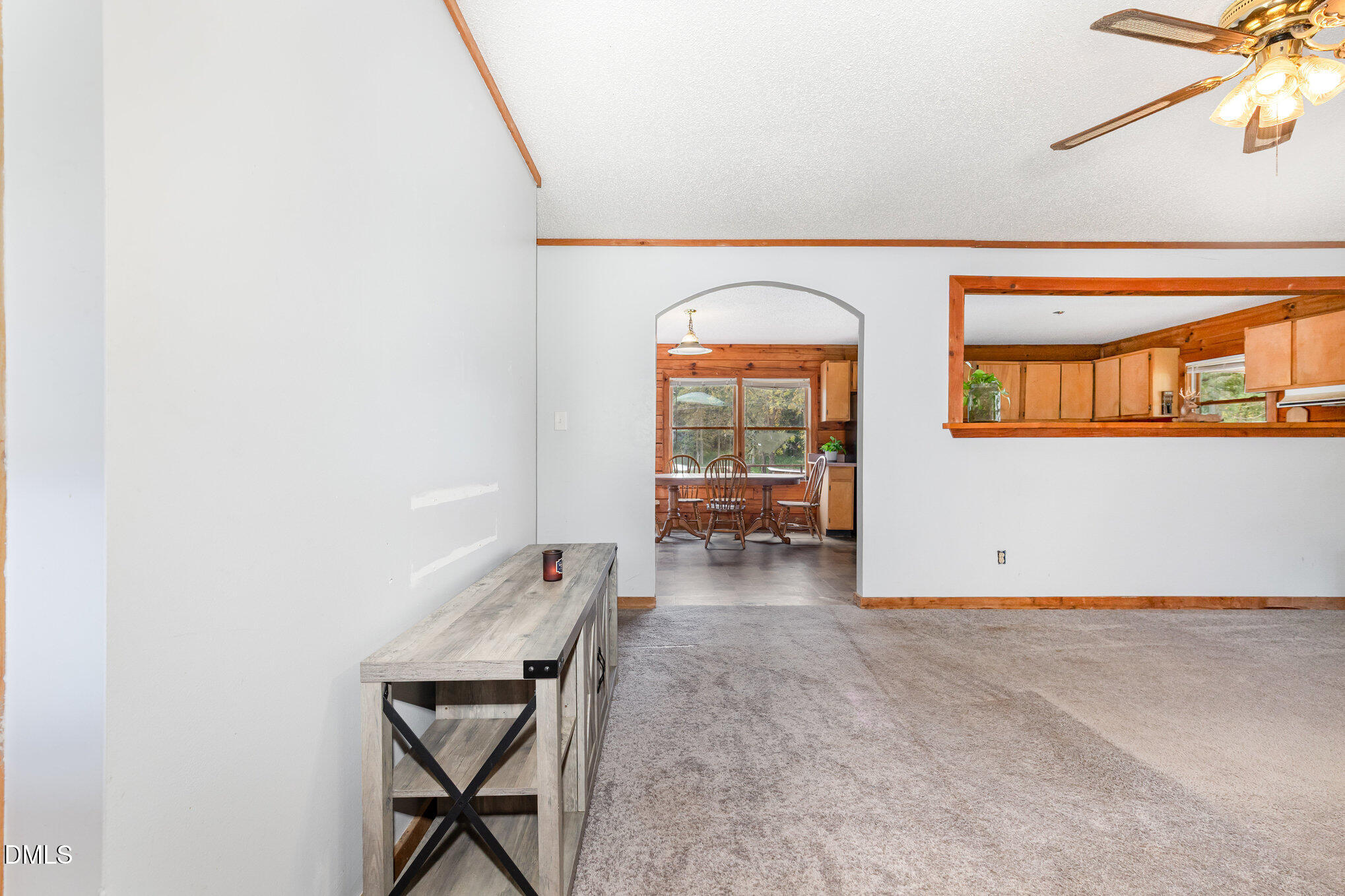 3018 University Station Road Durham, NC 27705 - Photo 4 of 32 a view of room with window and wooden floor