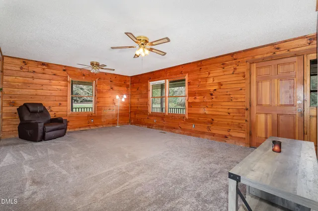 a view of livingroom with furniture and natural light