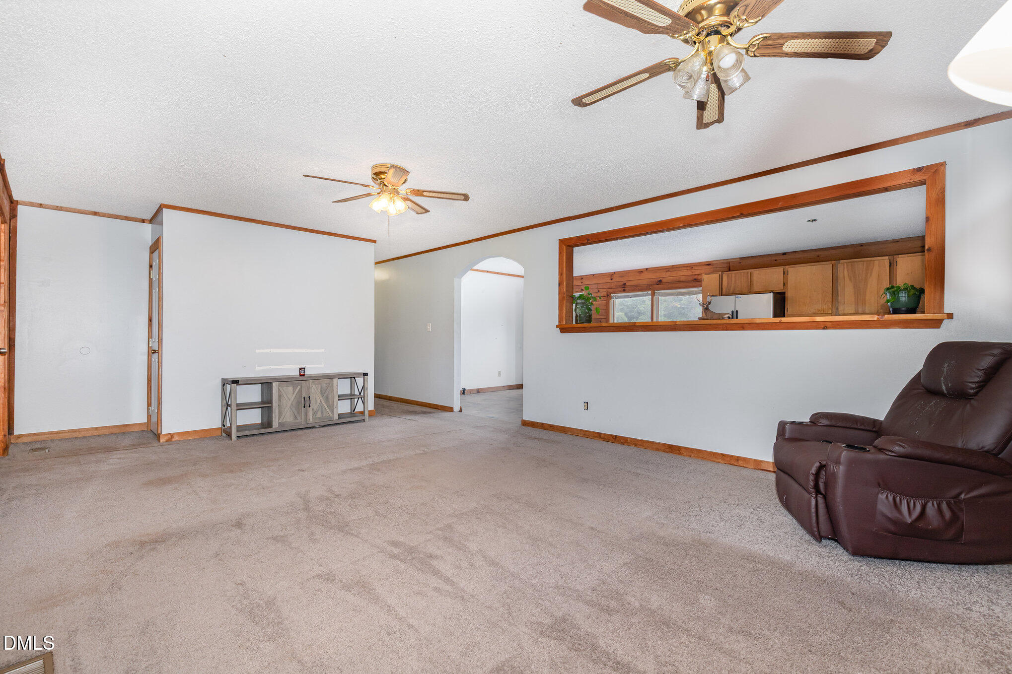 3018 University Station Road Durham, NC 27705 - Photo 7 of 32 a view of livingroom with furniture and ceiling fan
