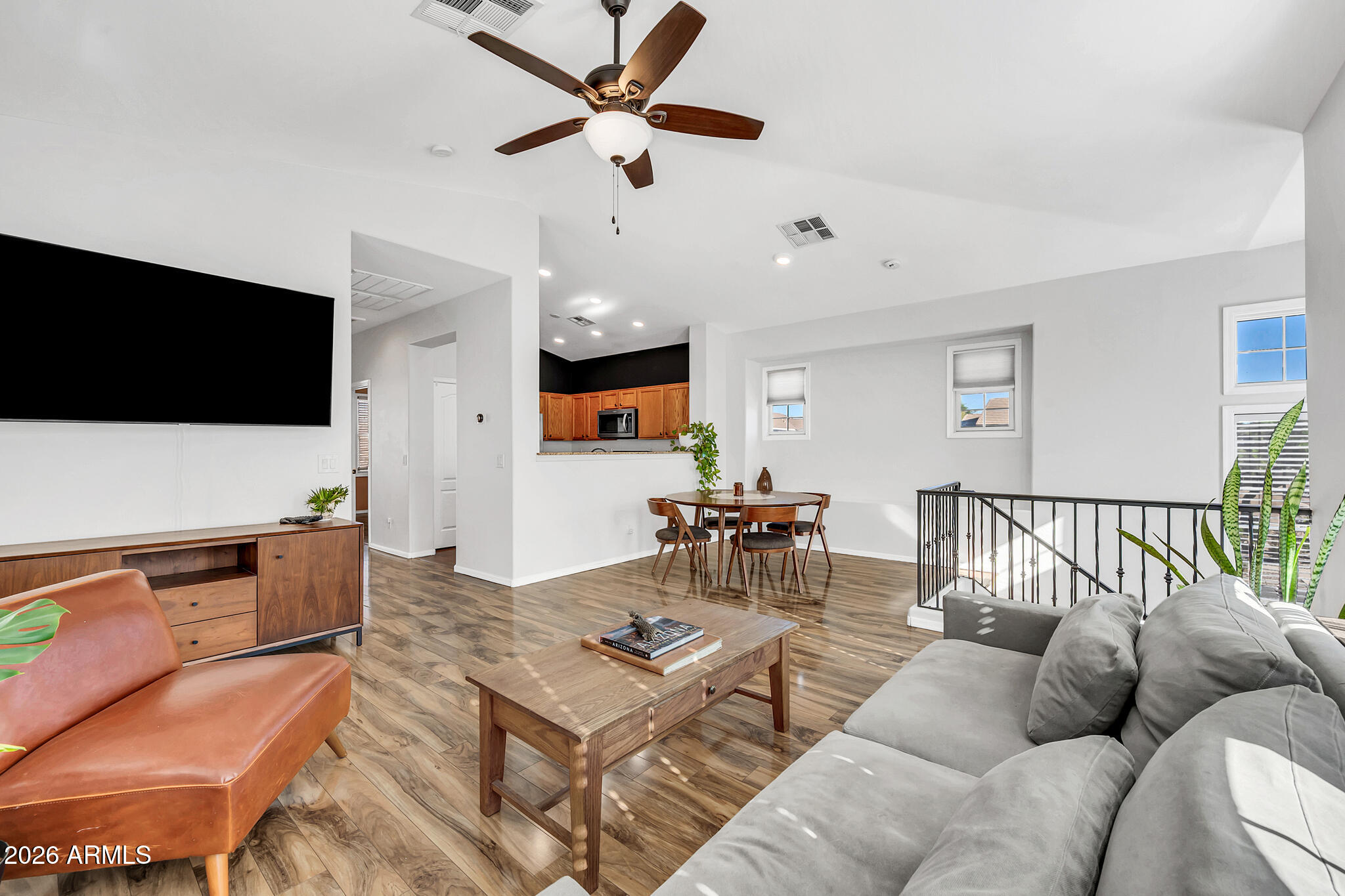 5627 South 21st Terrace Phoenix, AZ 85040 - Photo 10 of 32 a living room with furniture and a flat screen tv