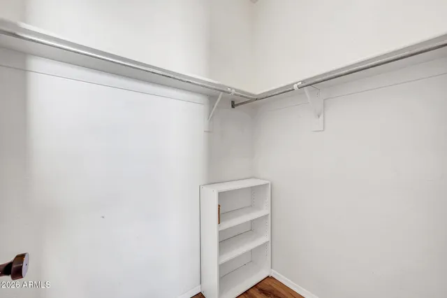 a kitchen with stainless steel appliances a microwave a stove and a refrigerator