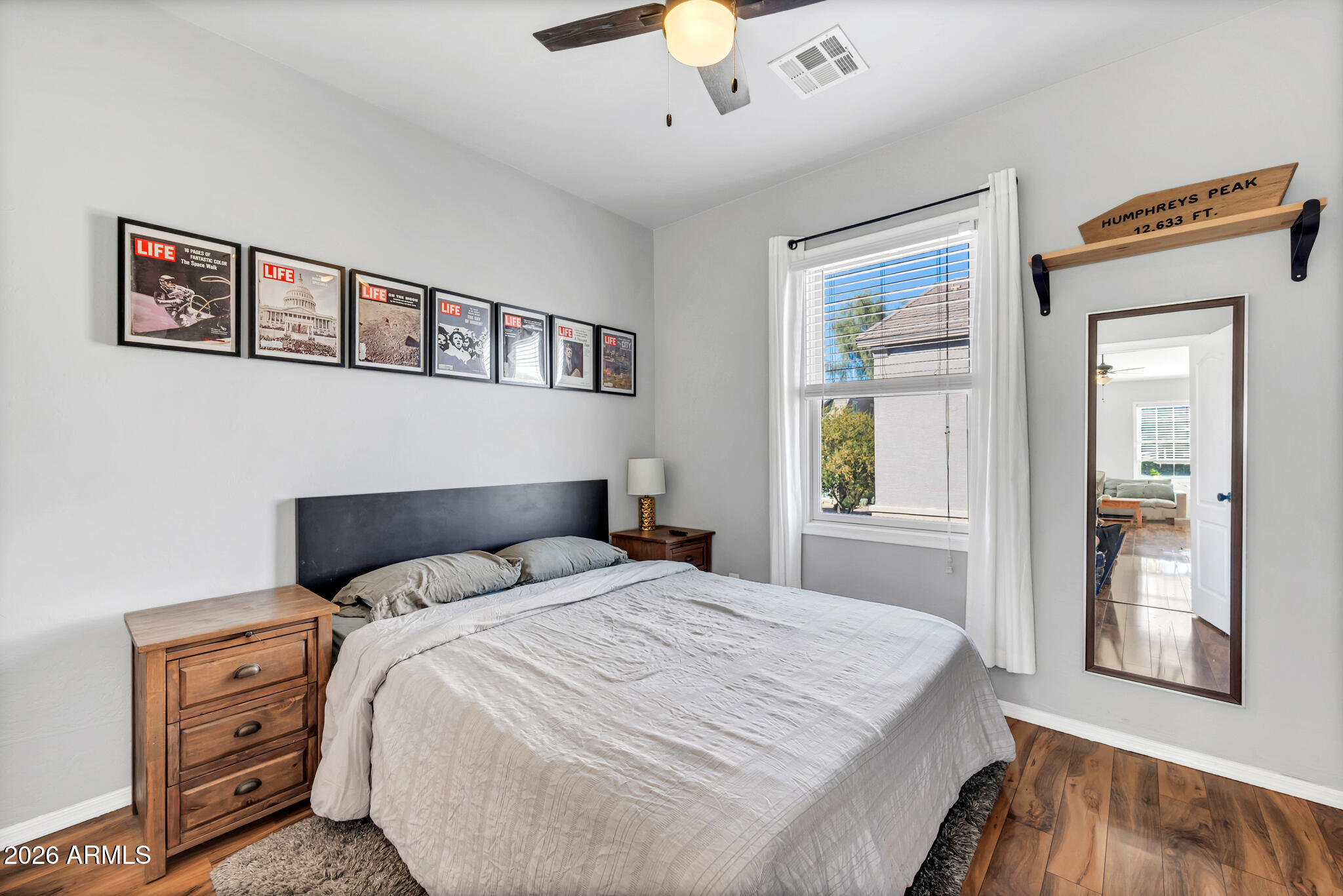 5627 South 21st Terrace Phoenix, AZ 85040 - Photo 27 of 32 a bedroom with a large bed and a window
