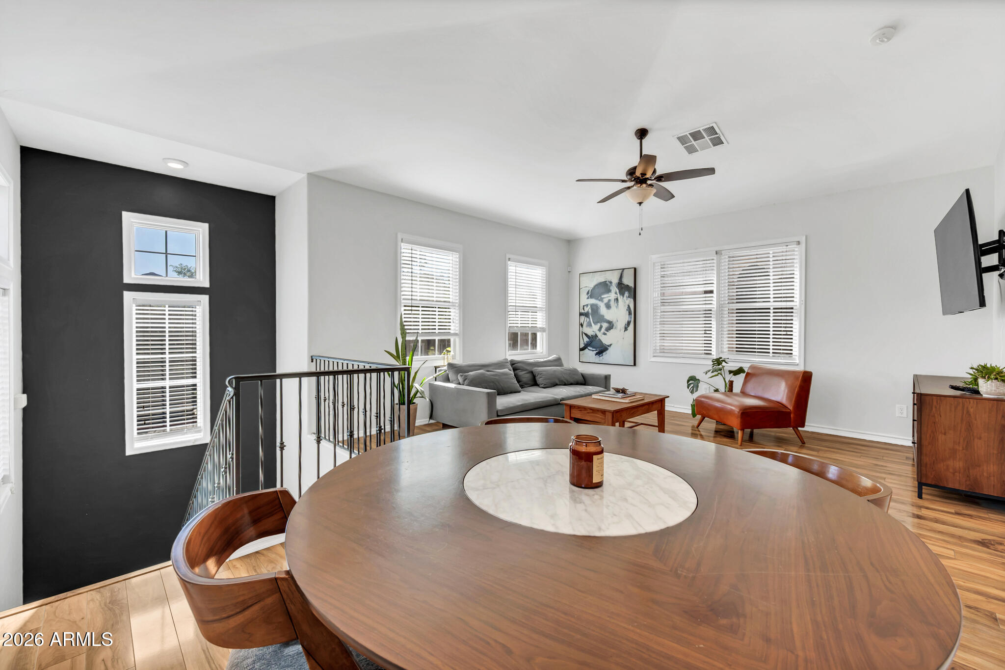 5627 South 21st Terrace Phoenix, AZ 85040 - Photo 6 of 32 a living room with furniture kitchen view and a window