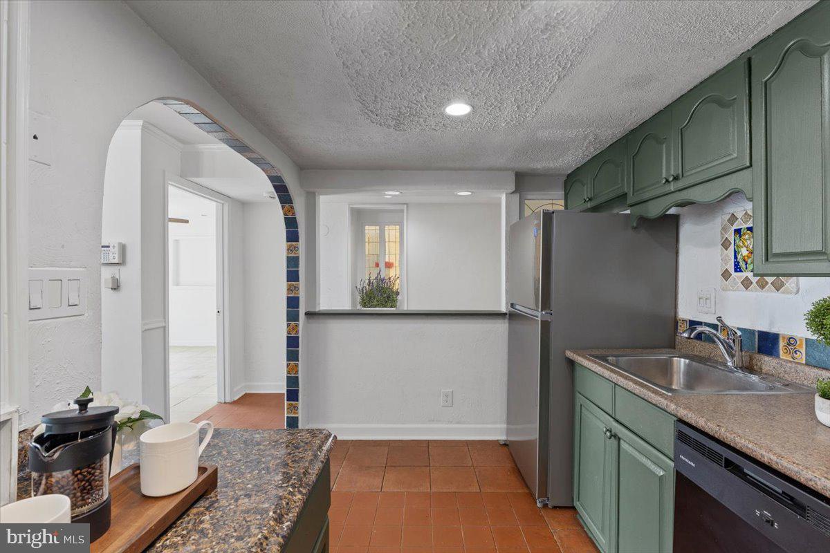 202 Buckingham Lane, Unit 102 Stafford, VA 22556 - Photo 12 of 37 a bathroom with a sink and a mirror