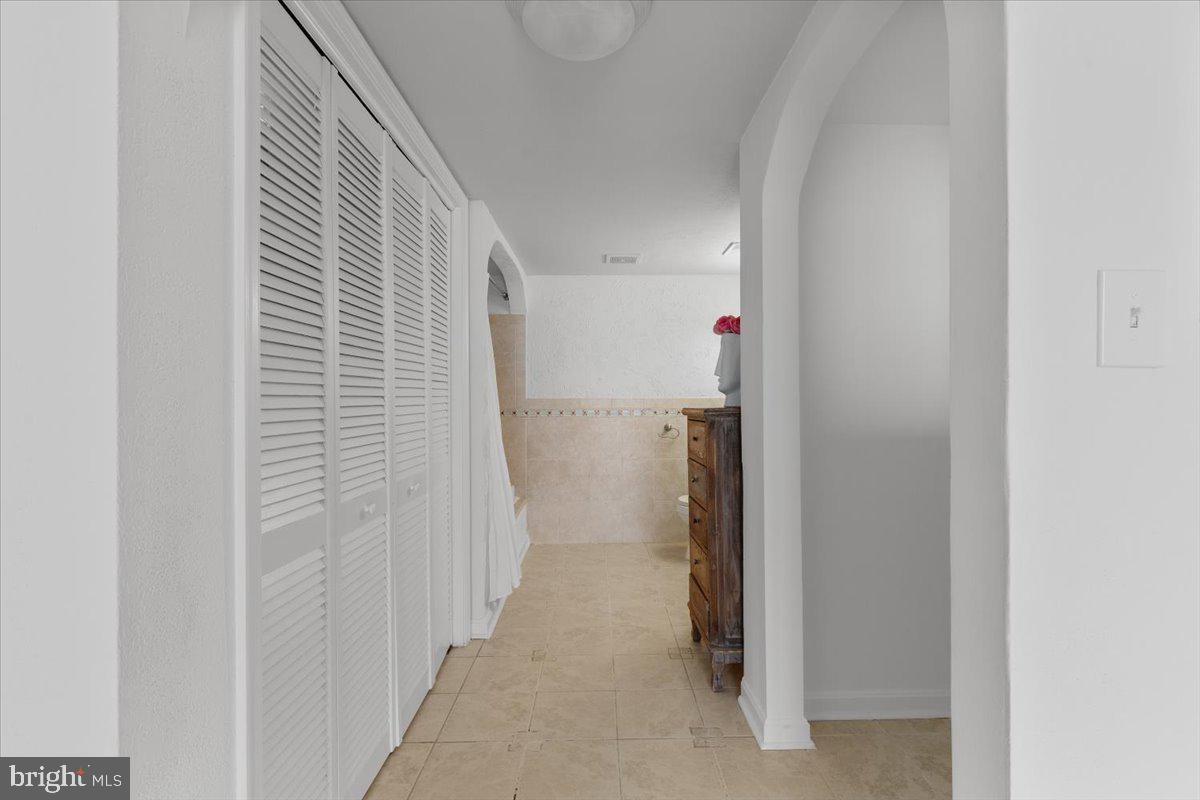 202 Buckingham Lane, Unit 102 Stafford, VA 22556 - Photo 18 of 37 a view of a hallway