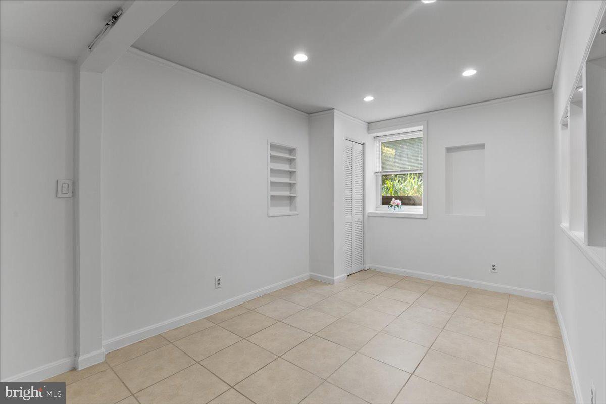 202 Buckingham Lane, Unit 102 Stafford, VA 22556 - Photo 27 of 37 a view of an empty room