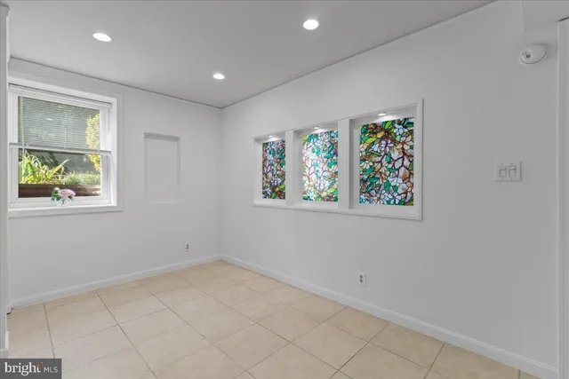 an empty room with windows