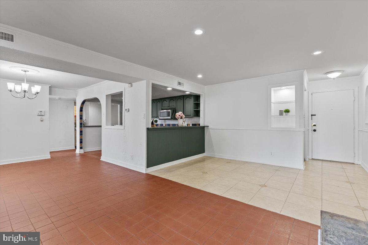 202 Buckingham Lane, Unit 102 Stafford, VA 22556 - Photo 3 of 37 a view of a kitchen with a sink