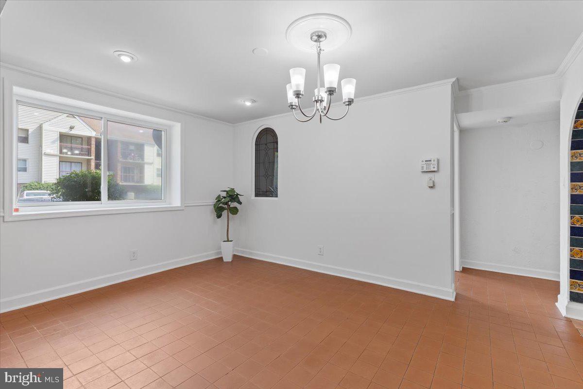 202 Buckingham Lane, Unit 102 Stafford, VA 22556 - Photo 9 of 37 a view of an empty room with a window