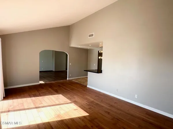 a view of a livingroom with wooden floor
